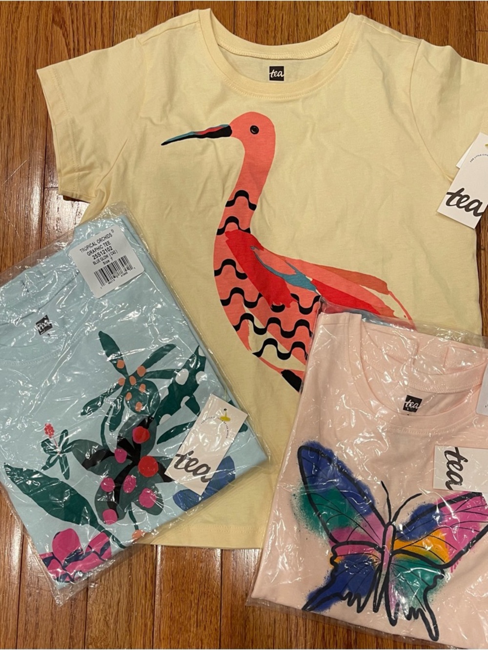 Three NWT Tea Collection t-shirts - size 7